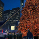 Per the court order, city workers take down the Christmas tree from New York's Rockefeller Plaza.